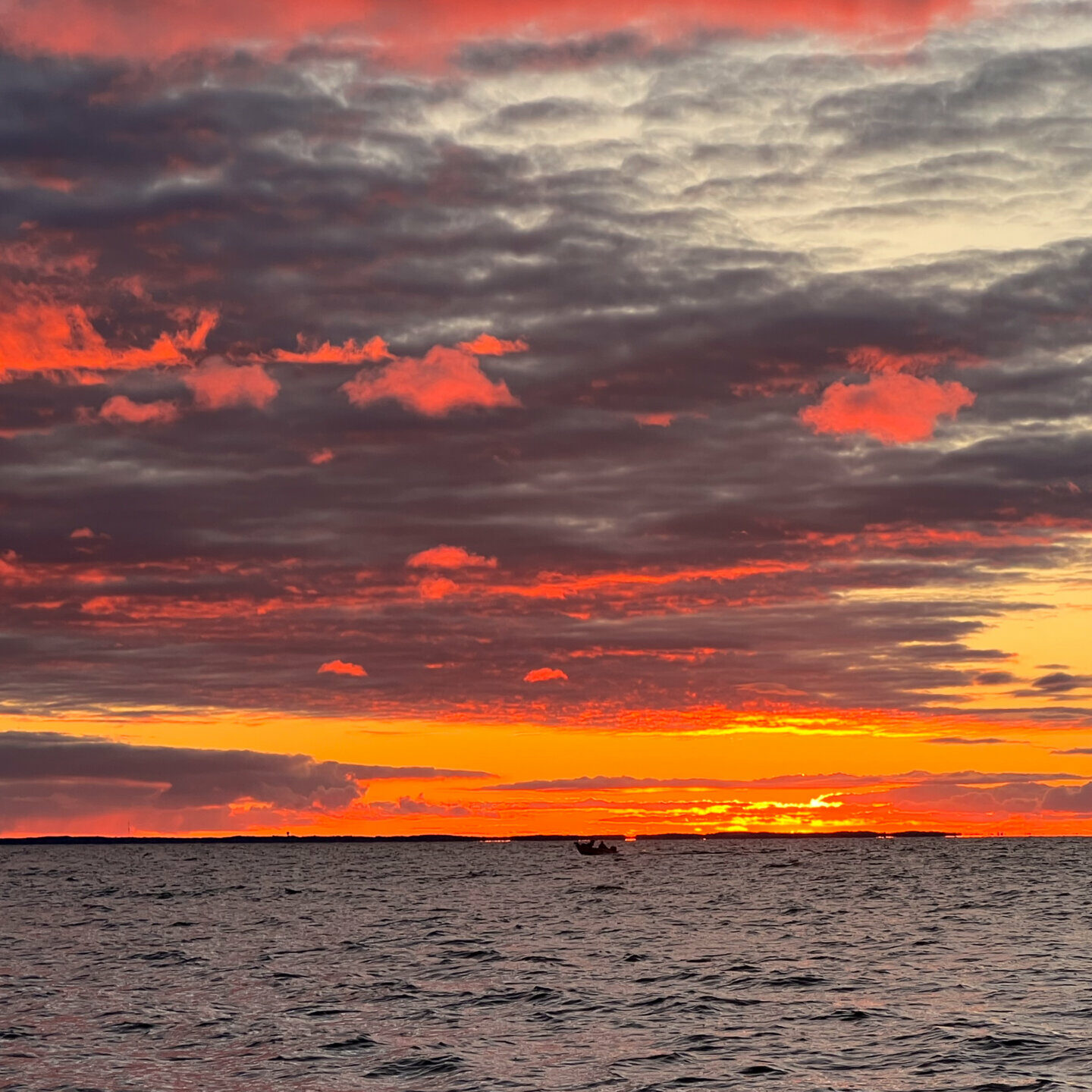 Vivid fall sunset over lake